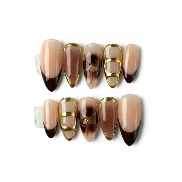 Set of nail art designs with brown, beige, and gold gradient on a white background