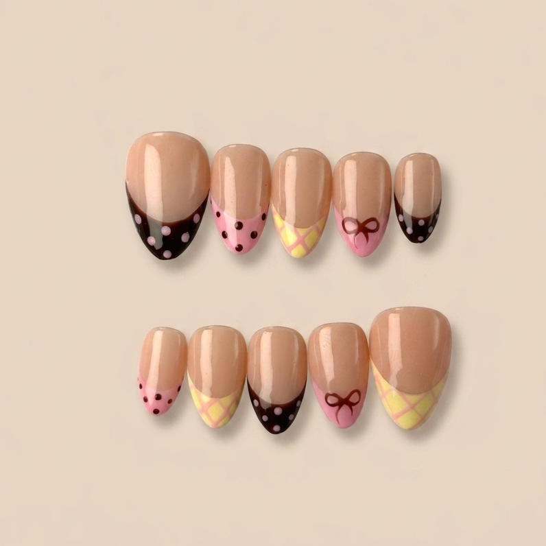 Set of nail designs with polka dots and bow shapes on a beige background
